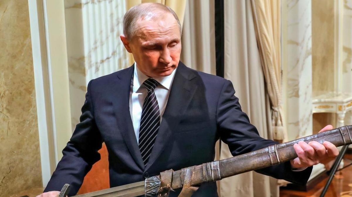 Russian President Vladimir Putin is considered one of many problems Europe will be facing in 2017. Here, he holds a sword on December 30, 2016.