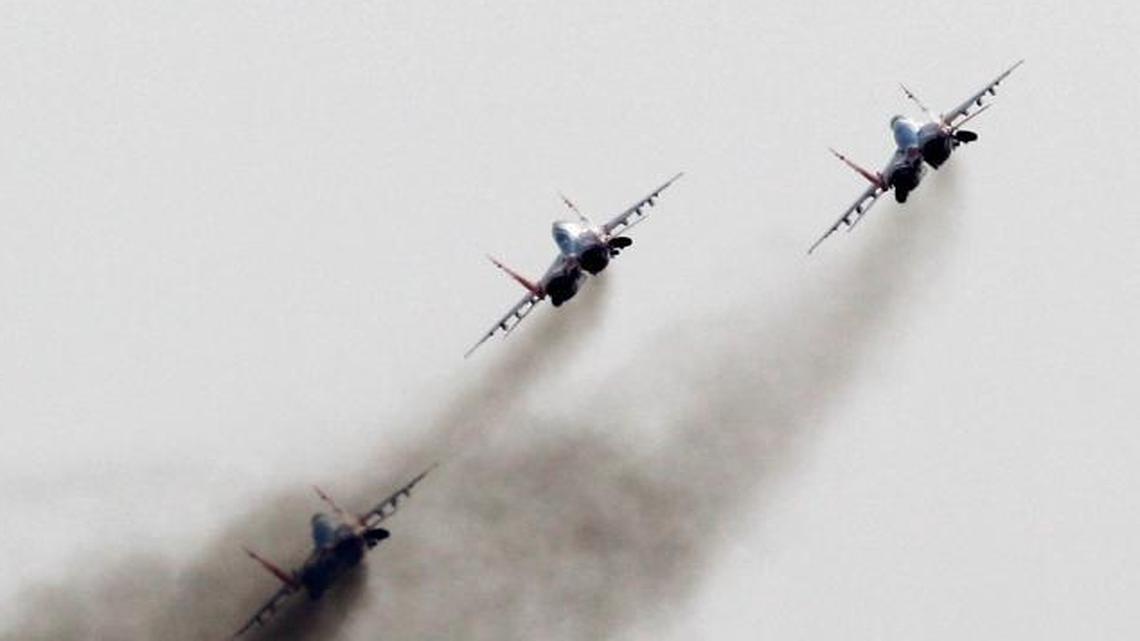 Russia’s military buildup continues at the planned pace despite its economic troubles. This photo, from Sept 1, 2012, from early in that buildup, show Mig-29 jet fighters of the Russian aerobatic team Strizhi (Swifts) performing in Batajnica, military airport near Belgrade, Serbia.