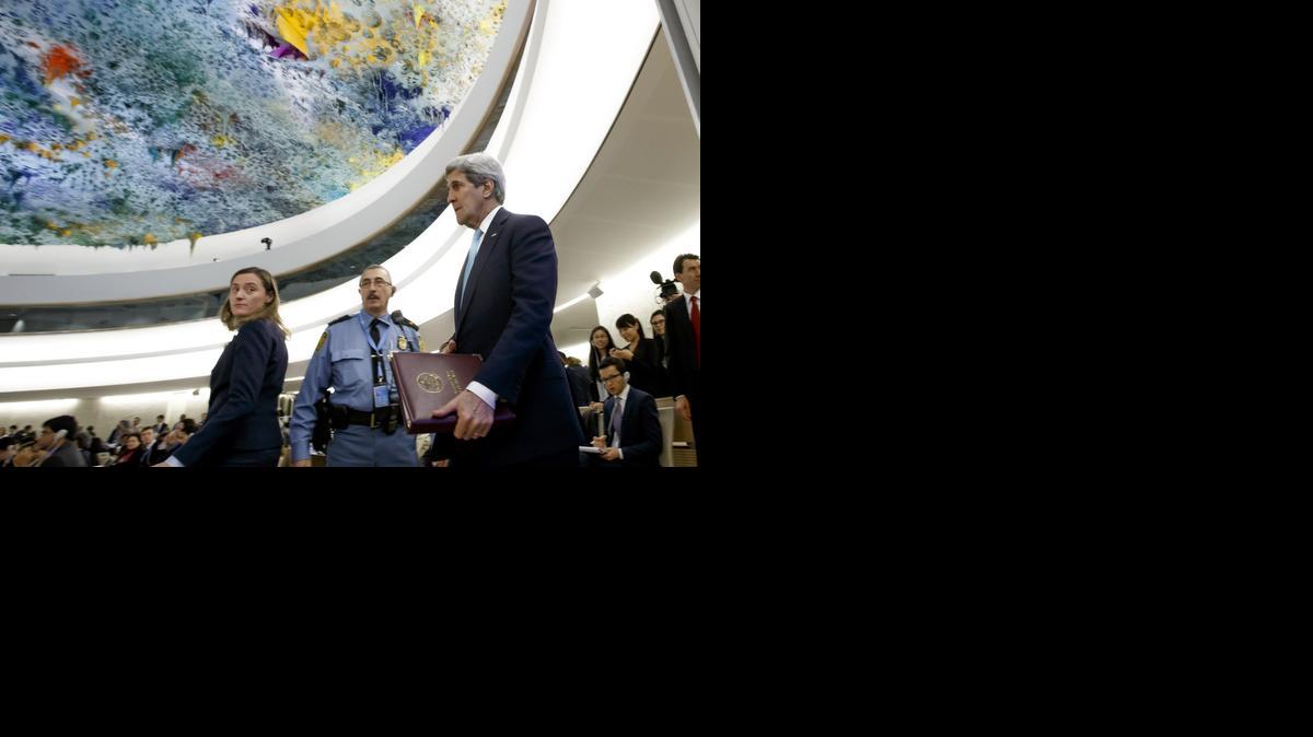 
U.S. Secretary of State John Kerry arrives to make a speech at the UN Human Rights Council at the European headquarters of the United Nations in Geneva, Switzerland, Monday, March 2, 2015. Kerry delivered a vigorous defense of Israel before the U.N. Human Rights Council, urging its members to end what the United States says is its unfair and biased focus on the Jewish State that could undermine its credibility. 
