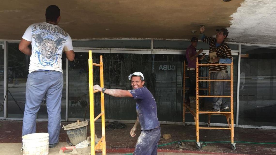 Improving job opportunities is a major concern for many Cubans. Men paint the Public Health Ministry building in downtown Havana on March 23, 2016.