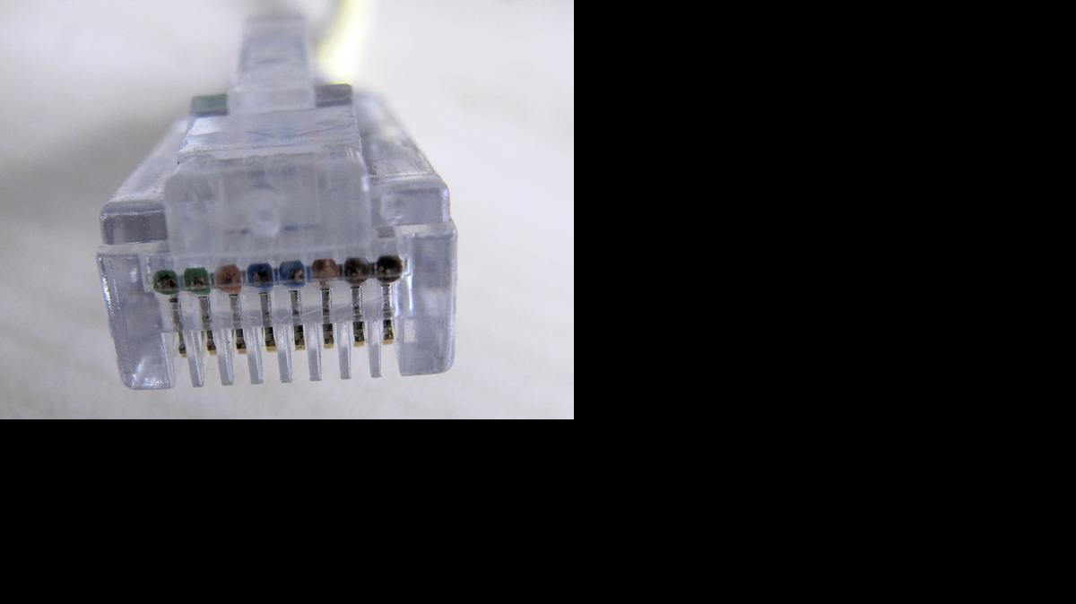 
A network cable is seen in Duesseldorf, Germany, in 2009. A new report from Russian cybersecurity firm Kaspersky Lab released Monday said its researchers identified malicious programs or worms that infected computers in multiple countries.
