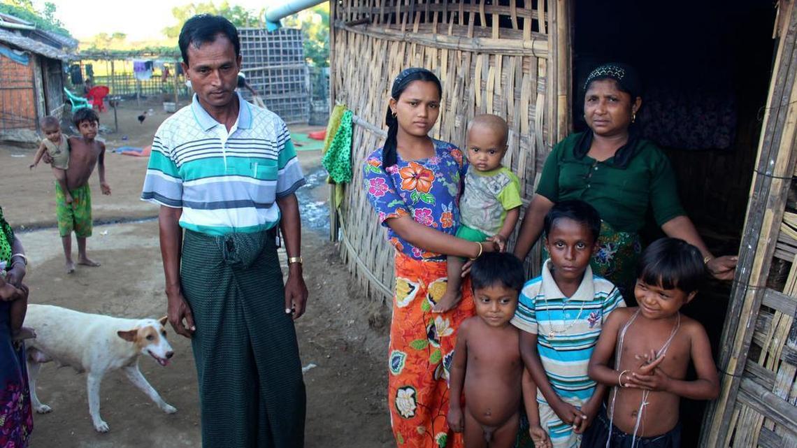 Abu Seedik and some of his family outside their thatched hut in the Da Paing refugee camp outside Sittwe, the capital of Myanmar’s Rachine state. Seedik lost his home and youngest daughter when mobs set fire to his house during sectarian violence in June 2012. He and his family have been living in the camp since.