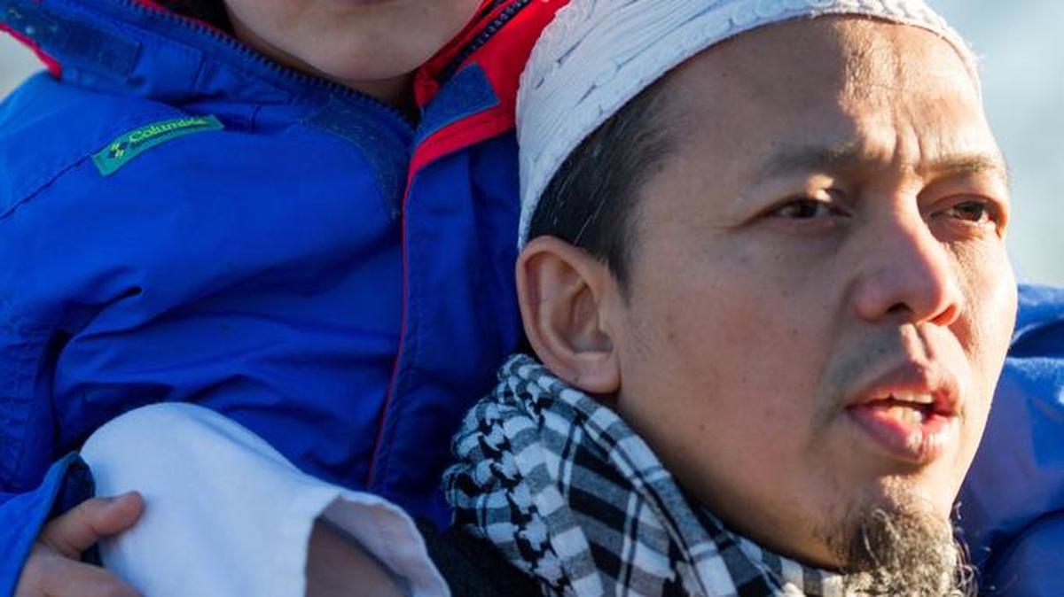Terra Kurmia and his son Adam, 4, participate in an interfaith gathering organized by American Muslim organizations to protest the actions of ISIS, on the steps of the Lincoln Memorial in Washington, D.C., on Nov. 20, 2015. Kurmia, an American citizen, is originally from Indonesia. "We are standing for the basic principles of America: life and liberty. It's the one thing that makes this country great." In the aftermath of the Paris massacre, American Muslims face a backlash that lumps them together with an extremist fringe, as politicians make sweeping anti-Muslim statements and advocacy groups report a spike in hate-crime incidents.