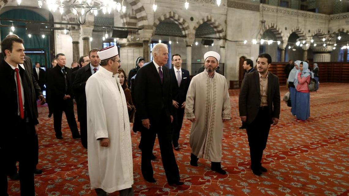U.S. Vice President Joe Biden, center, visits the Ottoman-era Sultan Ahmed Mosque, better known as the Blue Mosque in the historic Sultanahmet district of Istanbul, on the first day of his visit to Turkey, on Friday, Jan. 22, 2016. Biden has called on Turkey to protect freedom of expression at a time when social media websites are routinely shut down and hundreds of academics are facing legal proceedings over remarks criticising security operations against Kurdish militants in the southeast.