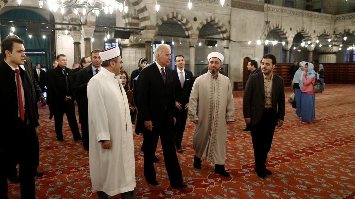 U.S. Vice President Joe Biden, center, visits the Ottoman-era Sultan Ahmed Mosque, better known as the Blue Mosque in the historic Sultanahmet district of Istanbul, on the first day of his visit to Turkey, on Friday, Jan. 22, 2016. Biden has called on Turkey to protect freedom of expression at a time when social media websites are routinely shut down and hundreds of academics are facing legal proceedings over remarks criticising security operations against Kurdish militants in the southeast.
