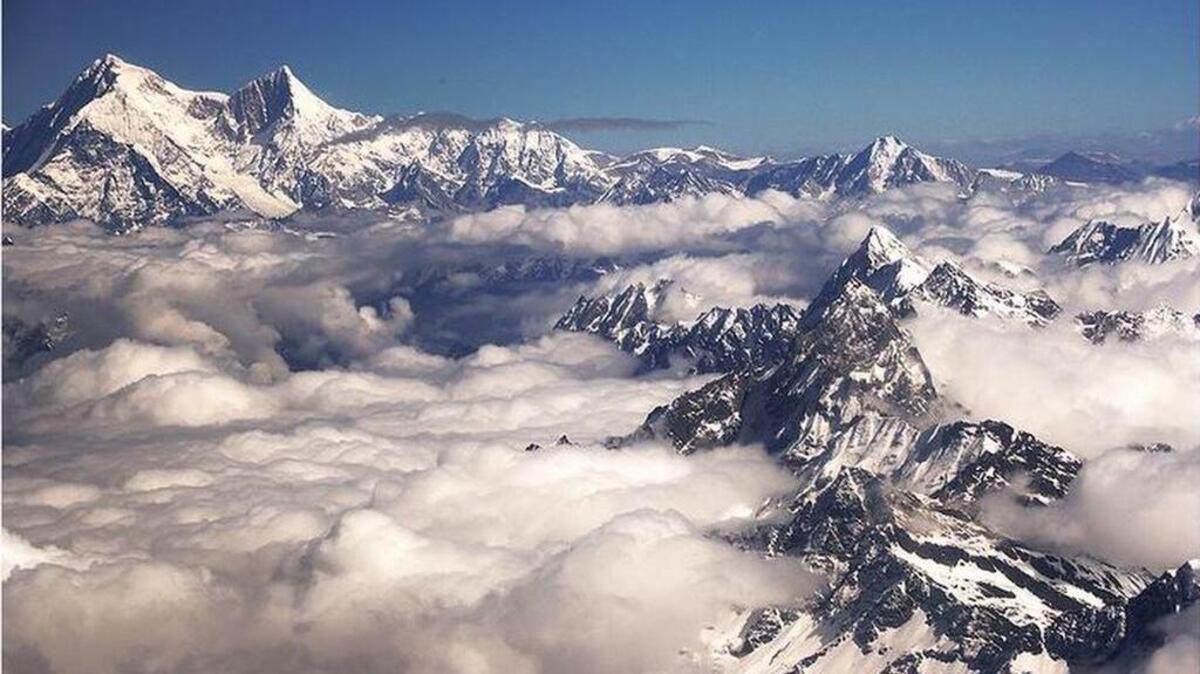 Tibet's Shishapangma is the world's fourteenth-tallest peak, a glacial mountain that rises some 26,000 feet above the sea.