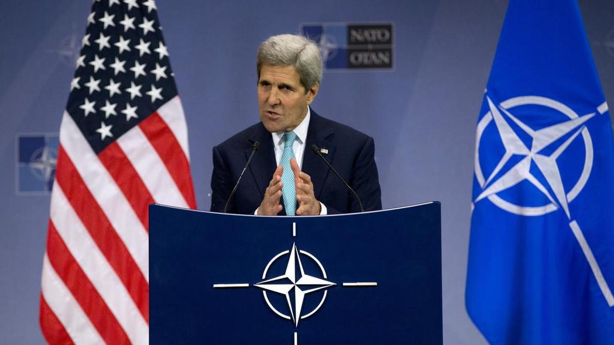 U.S. Secretary of State John Kerry speaks during a media conference at NATO headquarters in Brussels on Wednesday, Dec. 2, 2015. U.S. Secretary of State John Kerry says NATO members stand ready to step up military efforts against the Islamic State.