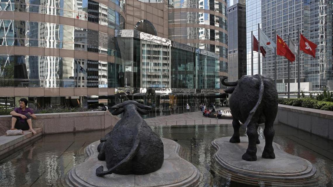 Two bull statues are displayed outside the Hong Kong Stock Exchange, Friday, June 24, 2016. Stock markets crashed, oil prices tumbled and the pound fell to a 31-year low on Friday as Britain's unprecedented vote to leave the European Union shocked investors and dragged the region, the world's largest economic bloc, into a new era of uncertainty. (