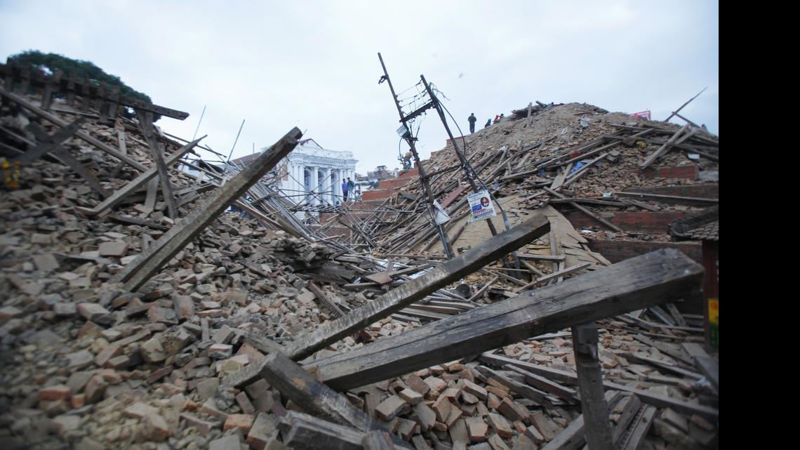 
Debris lie at Durbar Square after an earthquake in Kathmandu, Nepal, Saturday, April 25, 2015. A strong magnitude-7.9 earthquake shook Nepal’s capital and the densely populated Kathmandu Valley before noon Saturday, causing extensive damage with toppled walls and collapsed buildings, officials said. 
