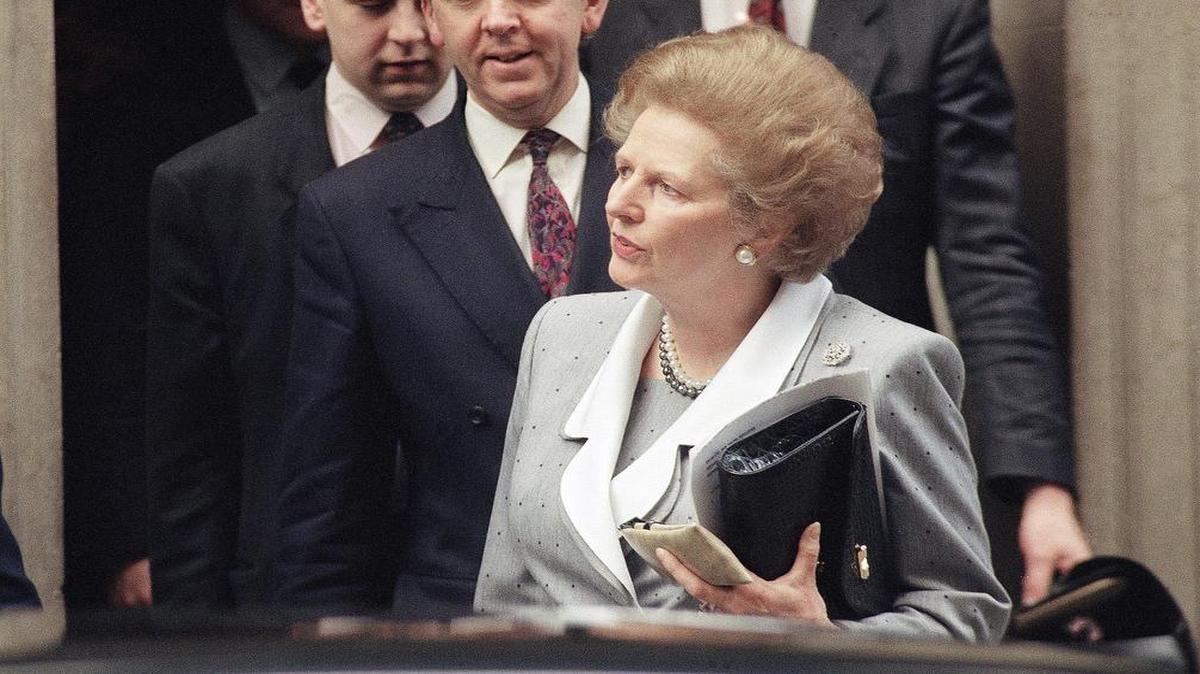In this March 15, 1990 file photo, Britain's Prime Minister Margaret Thatcher leaves 10 Downing Street in London en route to the House of Commons. Christie’s is set to sell personal possessions of late British Prime Minister Margaret Thatcher, including papers, mementoes, clothes and her iconic handbags. The auctioneer said Tuesday, Nov. 3, 2015 that 150 lots will go under the hammer Dec. 15 in London, with another 200 sold by online auction.