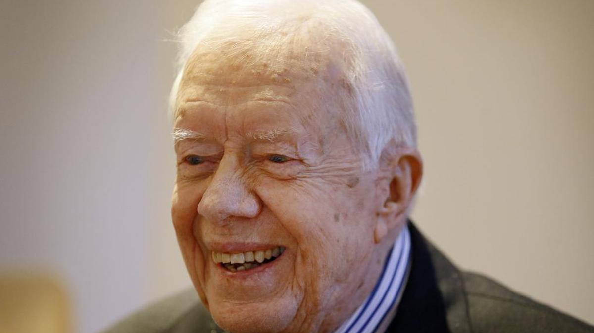 Former US President Jimmy Carter listened during a video interview with the Associated Press via a laptop at a hotel in London, Tuesday, Feb. 2, 2016.