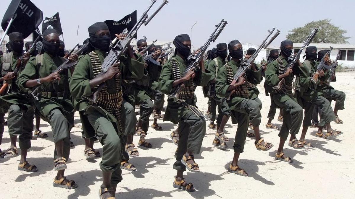 In this Thursday, Feb. 17, 2011 file photo, hundreds of newly trained al-Shabab fighters perform military exercises in the Lafofe area some 18 km south of Mogadishu, in Somalia.