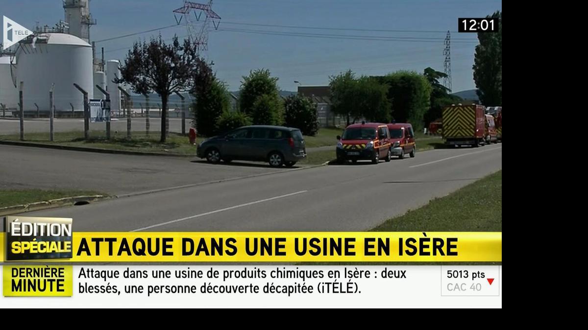 
In this screen grab taken from video provided by I Tele, emergency services at the scene outside a factory where a man was allegedly beheaded, in Saint-Quentin-Fallavier, France, Friday, June 26, 2015. French authorities have opened an investigation after an attack and explosion at a gas factory that left one person decapitated and several wounded. Banners with Arabic inscriptions were found near the body, an official said. 
