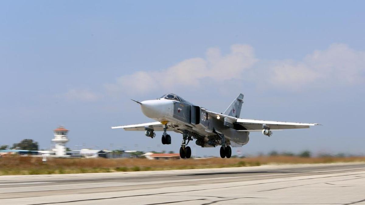 
A Russian SU-24 jet fighter takes off Saturday at the Hmeimim airbase in Syria. A similar aircraft crossed into Turkish airspace on Sunday.
