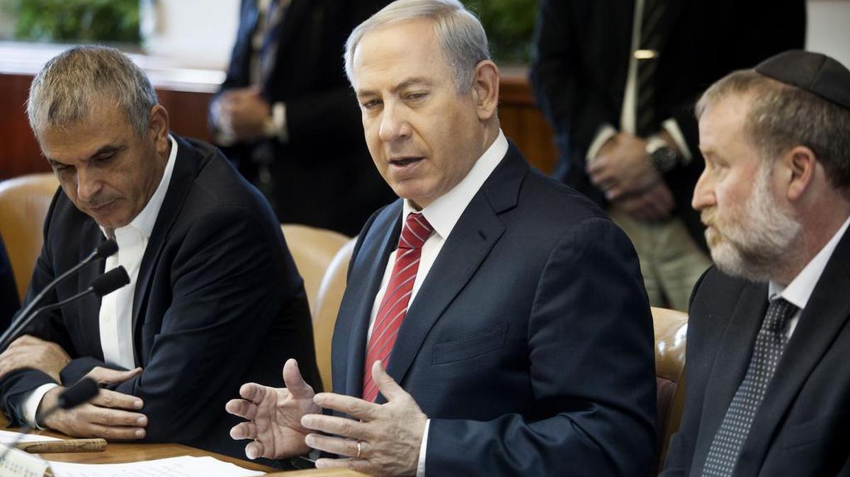 Israeli Prime Minister Benjamin Netanyahu speaks during the weekly cabinet meeting in Jerusalem on Sunday. Israeli security and military forces are preparing for possible attacks after separate threats issued over the weekend by the Islamic State and Hezbollah.