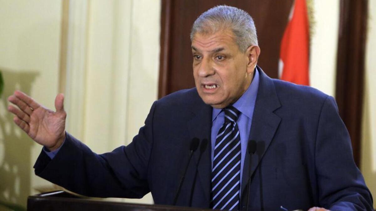 
Egyptian Prime Minister Ibrahim Mahlab, here speaking during a televised news conference in July 2014, has resigned after coming under criticism.
