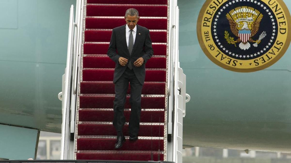 President Barack Obama, walking down the stairs of Air Force One upon his arrival, Wednesday, Oct. 28, 2015 at Andrews Air Force Base, Md. Obama is returning from his trip to Chicago.