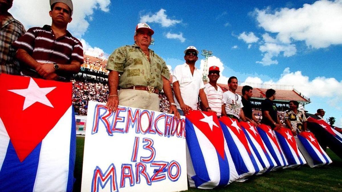 Cuban exiles in Miami stand in front of symbolic coffins in a demonstration against the Cuban government in 1994. Newly released FBI files show that the law enforcement agency kept close tabs on exiles in the early days of the Fidel Castro regime.