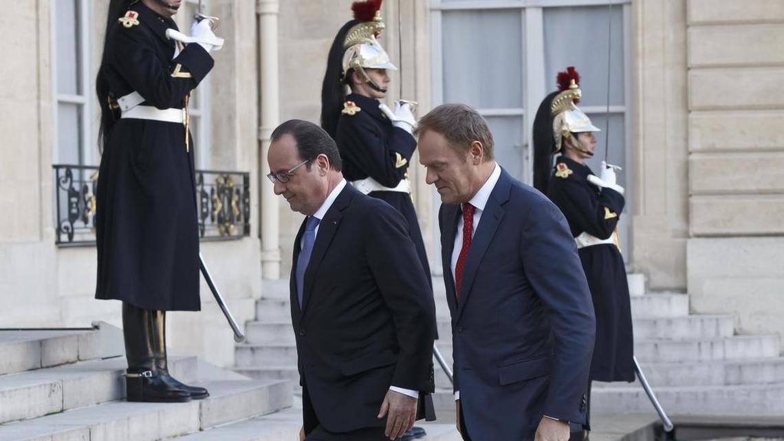 French President Francois Hollande, left, welcomes European Council President Donald Tusk at the Elysee Palace in Paris, Monday, Nov. 23, 2015. Tusk has said it is a political duty to jointly fight extremism, calling it the “greatest challenge of our time.”