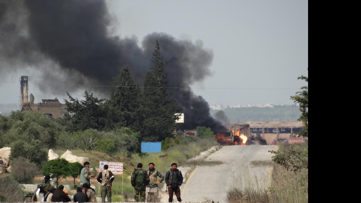 Syrian rebel fighters, led by Al Qaida's affiliate in Syria, the Nusra Front, captured the Assad regime's base at Qameed, a former brickworks in Idlib province, north Syria, killing scores of government troops and capturing seven tanks and a large quantity of other weapons and ammunition on April 27, 2015.