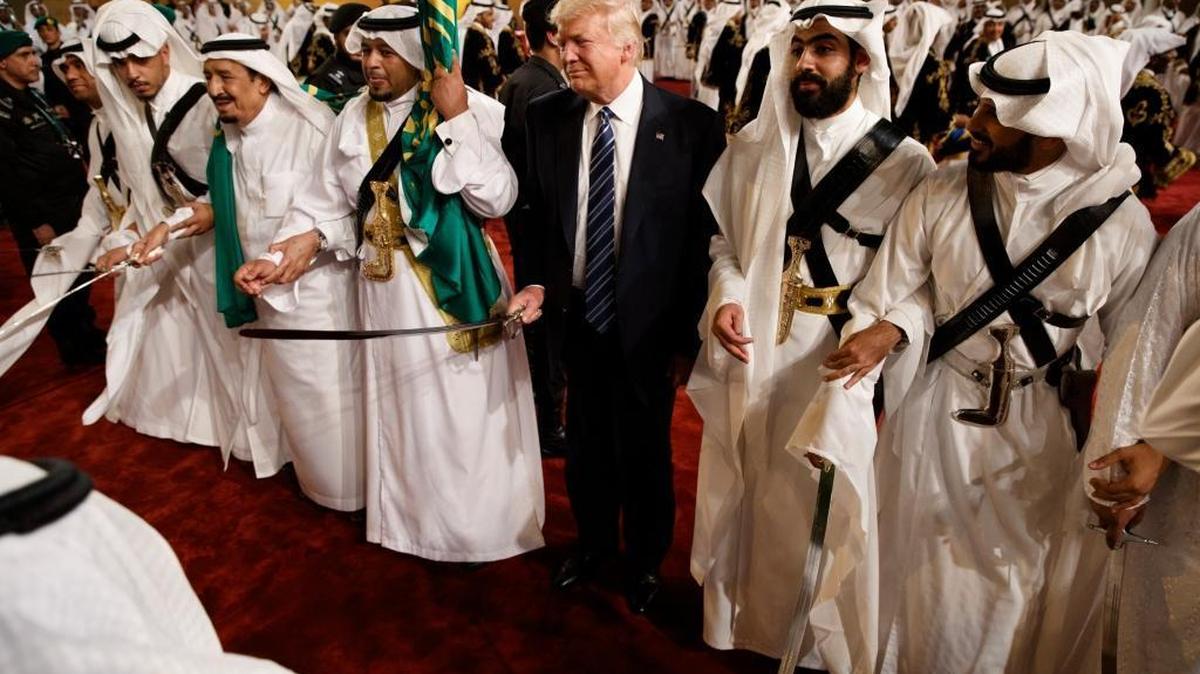 President Donald Trump took part in a traditional dance during the Saudi ceremony welcoming him to Riyadh May 20.