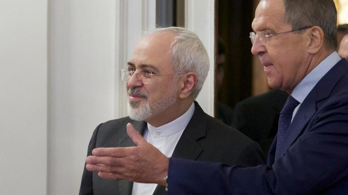 
Russian Foreign Minister Sergey Lavrov, right, welcomes his Iranian counterpart, Mohammad Javad Zarif, in Moscow on Monday, Aug. 17, 2015. The two held talks on implementation of the nuclear deal and on international efforts to mediate the conflict in Syria.
