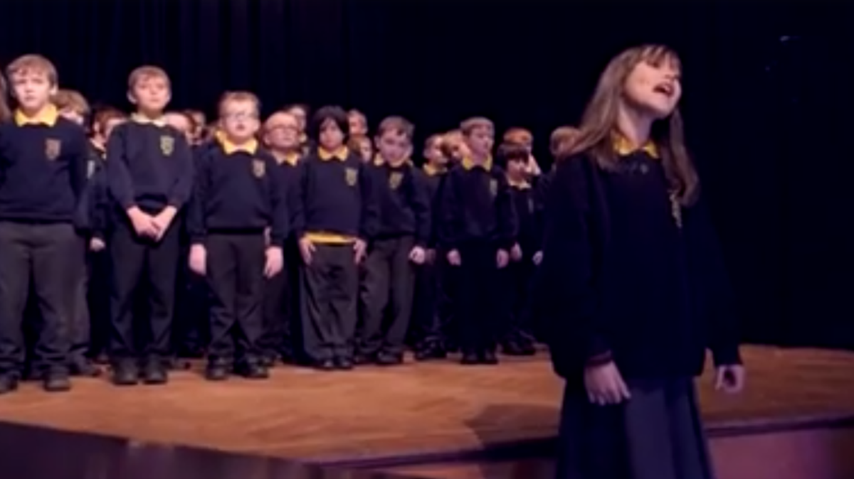 Kaylee Rogers, front, sang a modified version of ‘Hallelujah’ at a school event that has since gone viral.