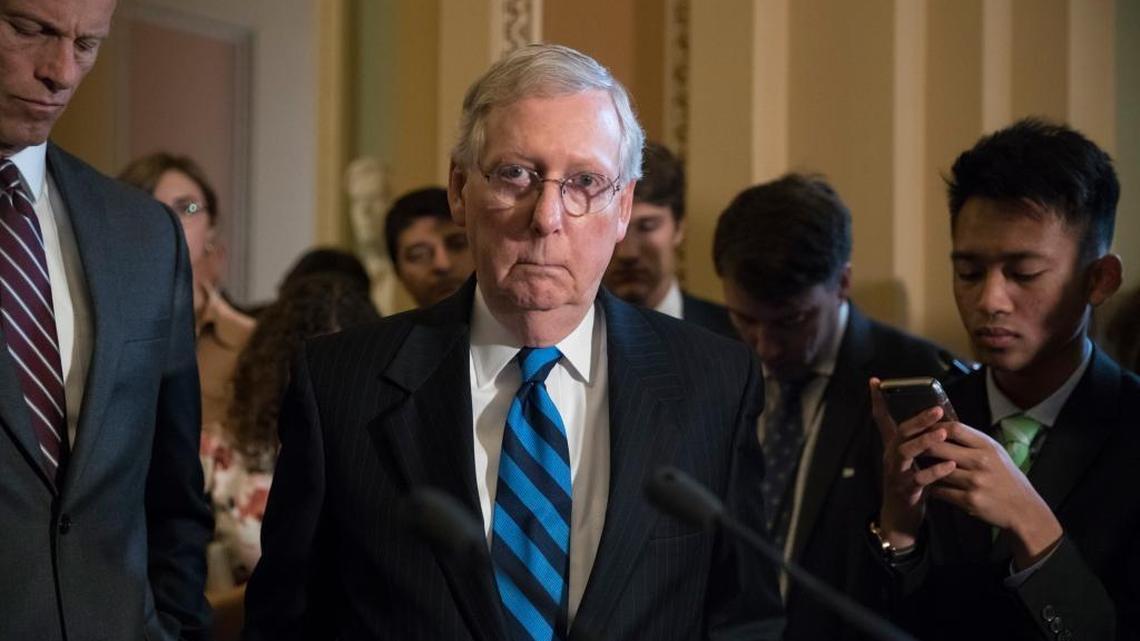 Senate Majority Leader Mitch McConnell of Kentucky, joined by Sen. John Thune, R-S.D., left, the Republican Conference chairman, meets with reporters after a closed-door Republican strategy session, Tuesday, July 11, 2017, on Capitol Hill in Washington. McConnell said Senate Republicans will begin voting on their revised health care bill next week.