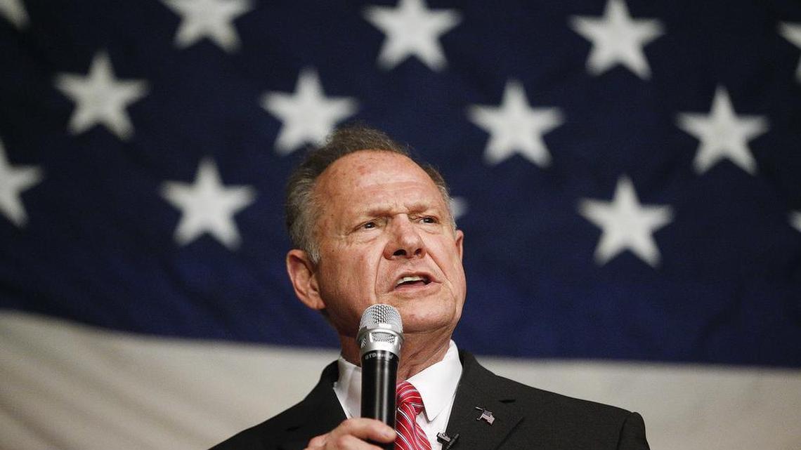 In this Dec. 5, 2017, photo, former Alabama Chief Justice and U.S. Senate candidate Roy Moore speaks at a campaign rally in Fairhope Ala. Moore has ignored all the rules of modern-day politics. But on the ground in Alabama, some believe the Republican Senate candidate is poised to win the state’s special election on Tuesday in a race that features extraordinary parallels with President Donald Trump’s White House run one year ago.