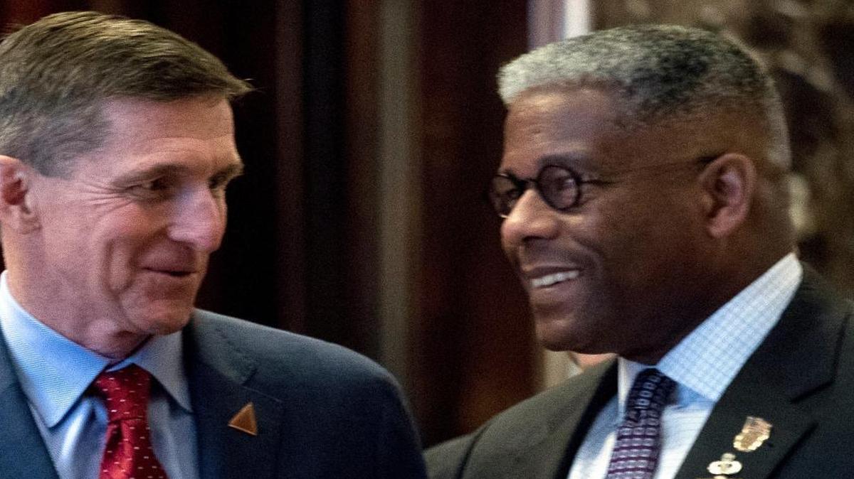 Michael Flynn, President-elect Donald Trump's nominee for National Security adviser, left, speaks with former Rep. Allen West, R-Fla., right, at Trump Tower, Monday, Dec. 5, 2016, in New York.