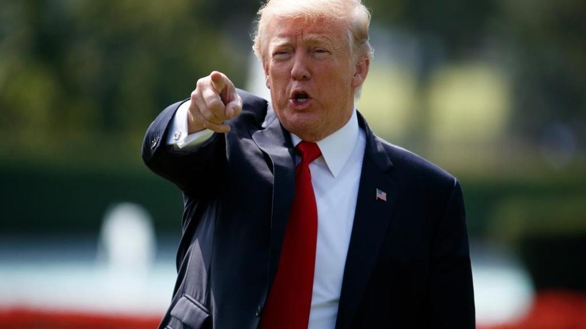 President Donald Trump talks to reporters before boarding Marine One on the South Lawn of the White House in Washington, Wednesday, Aug. 30, 2017, for a short trip to Andrews Air Force Base, Md., then onto Missouri.