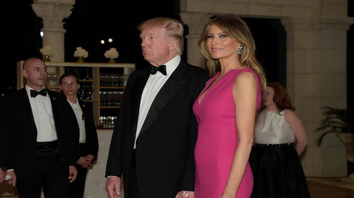 President Donald Trump and first lady Melania Trump arrive for the 60th annual Red Cross Gala at Trump's Mar-a-Lago resort in Palm Beach, Fla., Saturday, Feb. 4, 2017.
