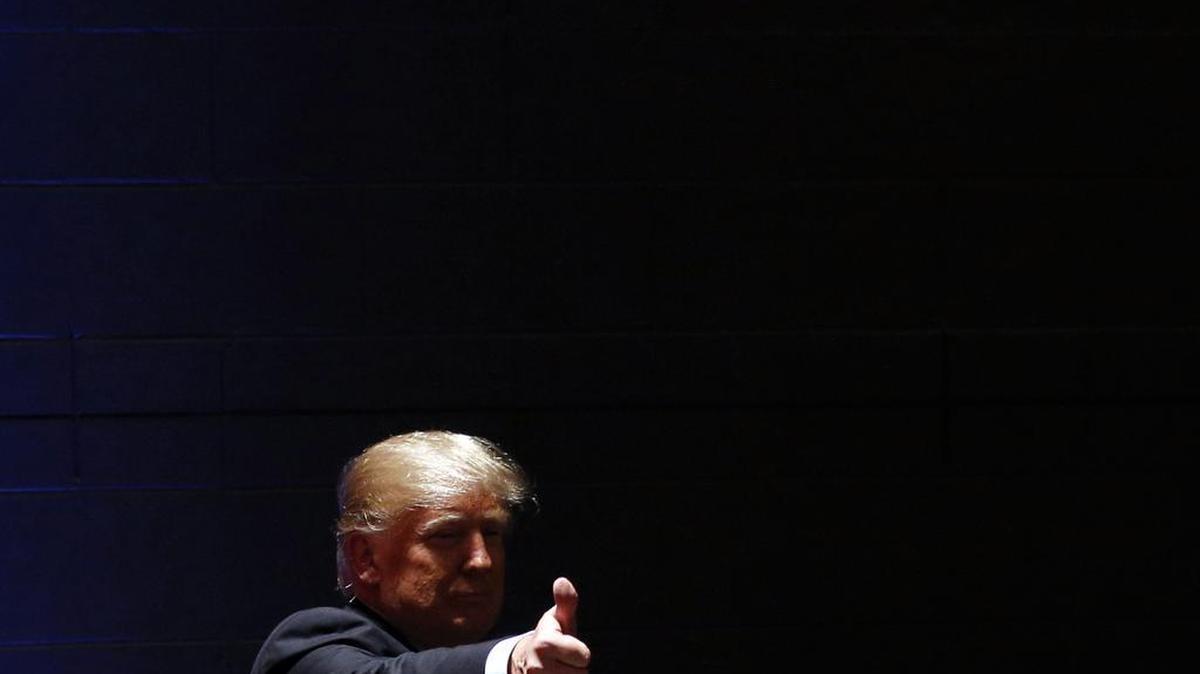 Republican presidential candidate Donald Trump acknowledges attendees after a campaign event at St. Norbert College in De Pere, Wis., on Wednesday.