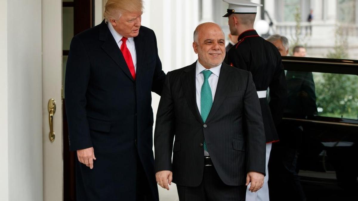 President Donald Trump meets greets Iraqi Prime Minister Haider al Abadi at the White House in Washington, Monday, March 20, 2017.