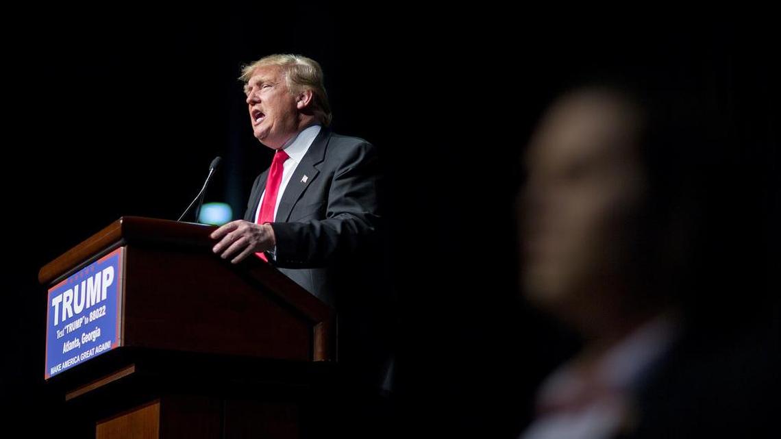Republican presidential candidate Donald Trump speaks at a campaign event Sunday in Atlanta. Though many won’t say so on the record, still hoping that anyone-but-Trump will win their party’s nod, several Republican strategists are voicing fear about the fate of the rest of their party’s candidates if the wealthy businessman becomes the GOP standard-bearer.