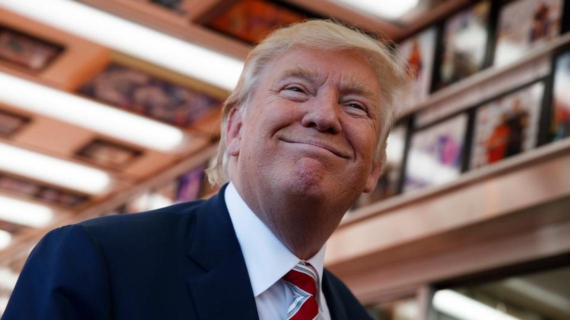 Republican presidential candidate Donald Trump smiles as he listens to a reporter’s question at Geno's Steaks, Thursday, Sept. 22, 2016, in Philadelphia. Trump faces Hillary Clinton in Monday’s presidential debate.