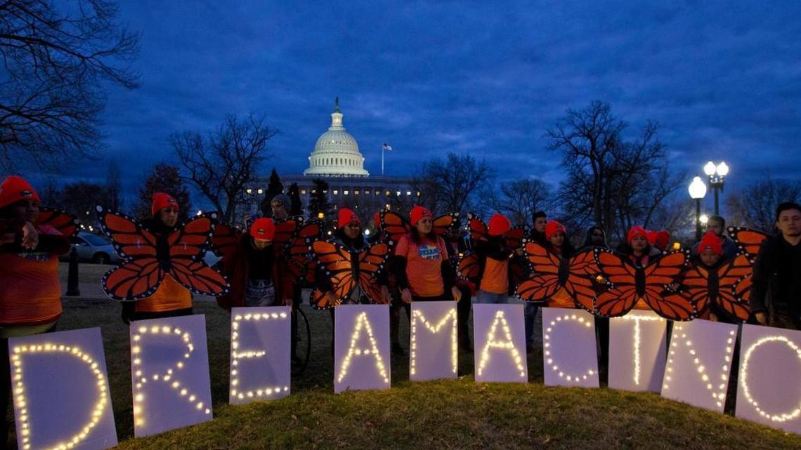 Demonstrators rally in support of Deferred Action for Childhood Arrivals (DACA) outside the Capitol, Sunday, Jan. 21, 2018, in Washington, on the second day of the federal shutdown. Democrats have been seeking a deal to protect the "Dreamers," who have been shielded against deportation by DACA, which President Donald Trump halted last year.