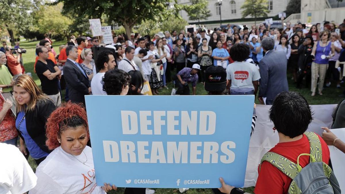 Immigrant rights supporters gather at the U.S. Capitol in Washington, Tuesday, Sept. 26, 2017. The groups and allies are demanding that Congress pass a 'Clean Dream Act' that will prevent the deportation of Dreamers working and studying in the U.S., and reform legalization of those with Temporary Protection Status who came to the U.S. fleeing natural disasters or civil wars.