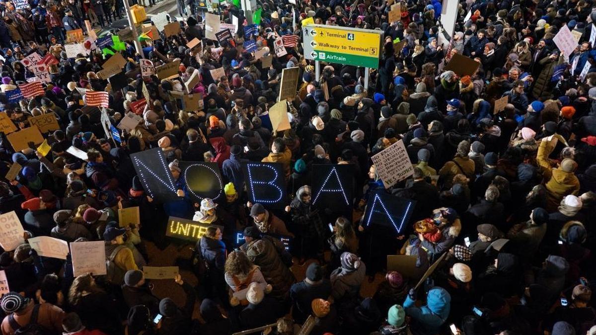 Protesters assemble at John F. Kennedy International Airport in New York, Saturday, Jan. 28, 2017, after earlier in the day two Iraqi refugees were detained while trying to enter the country.