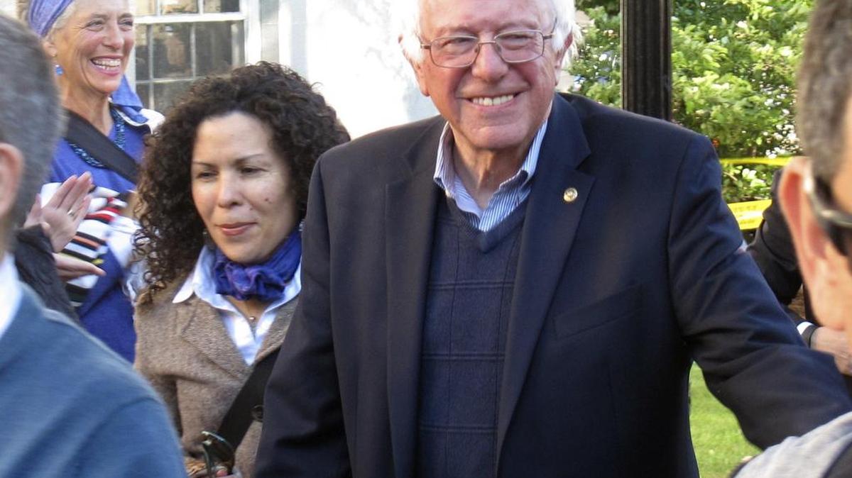 Democratic presidential candidate Sen. Bernie Sanders, I-Vt., arrives at City Hall Park in Burlington, Vt., on Monday. Sanders took part in a march and vigil for the people killed and wounded during a shooting at an Orlando, nightclub.