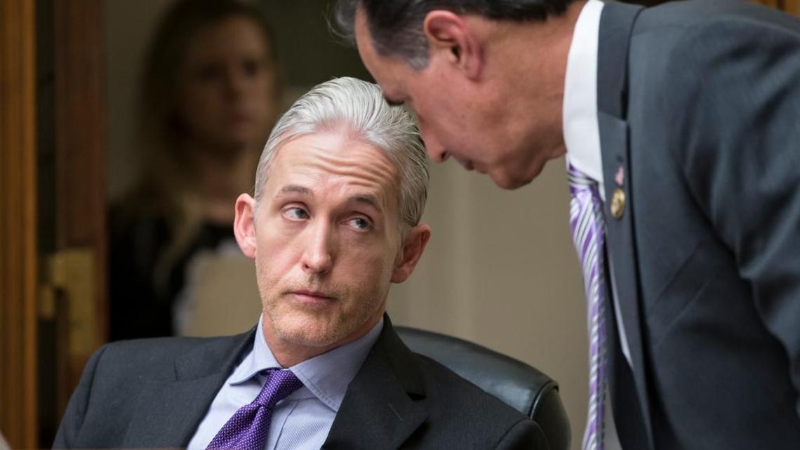 Rep. Trey Gowdy, R-S.C., chairman of the House Select Committee on Benghazi, confers with Rep. Gary Palmer, R-Ala., right, as they and members of the House Oversight Committee question FBI Director James Comey about his decision not to prosecute Hillary Clinton over her private email setup during her time as secretary of state.