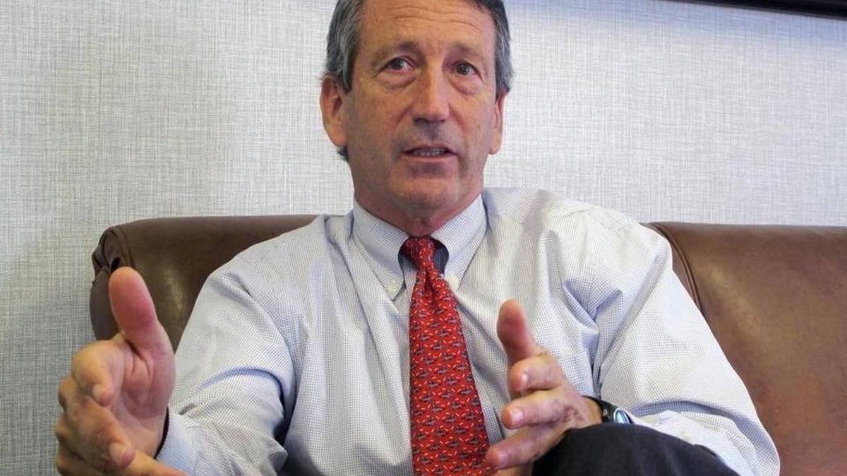 In this Dec. 18, 2013, file photo, U.S. Rep. Mark Sanford, R-S.C., discusses his first months back in Congress during an interview in Mount Pleasant, S.C.