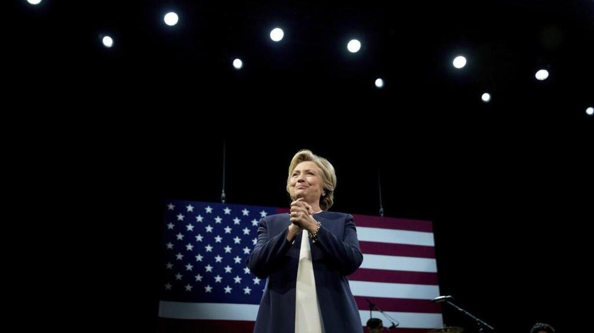 Democratic presidential candidate Hillary Clinton takes the stage at a fundraiser at the Civic Center Auditorium in San Francisco, Thursday, Oct. 13, 2016.
