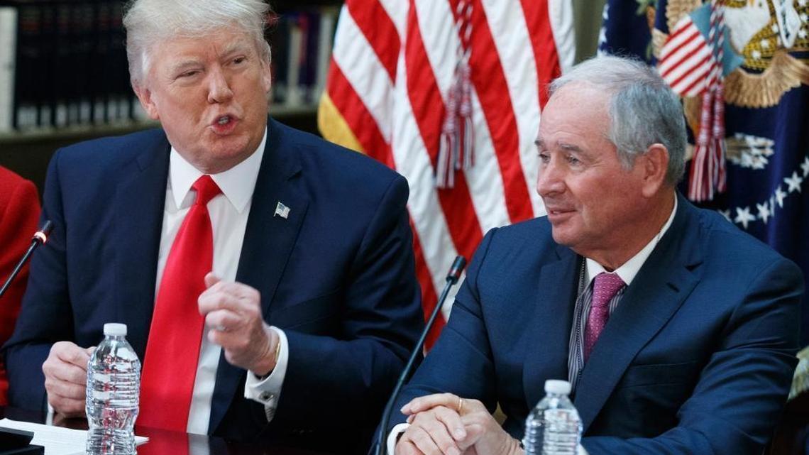 Blackstone Group CEO Stephen Schwarzman, an adviser to President Donald Trump, listens as Trump addresses a meeting with business leaders in the Eisenhower Executive Office Building in Washington, Tuesday, April 11, 2017. Schwarzman, who runs one of the world’s largest private equity funds, is one of several Trump allies who have financial stakes in infrastructure projects that could benefit from the White House’s actions.