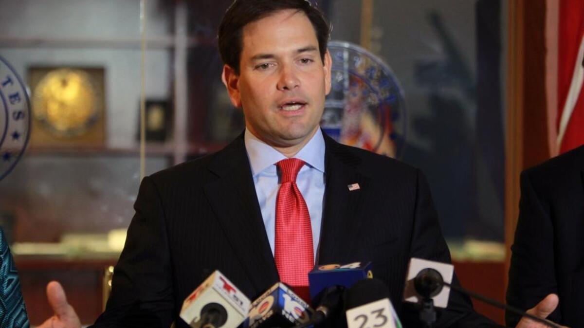 Republican Sen. Marco Rubio speaks to reporters at his Doral office earlier this month.