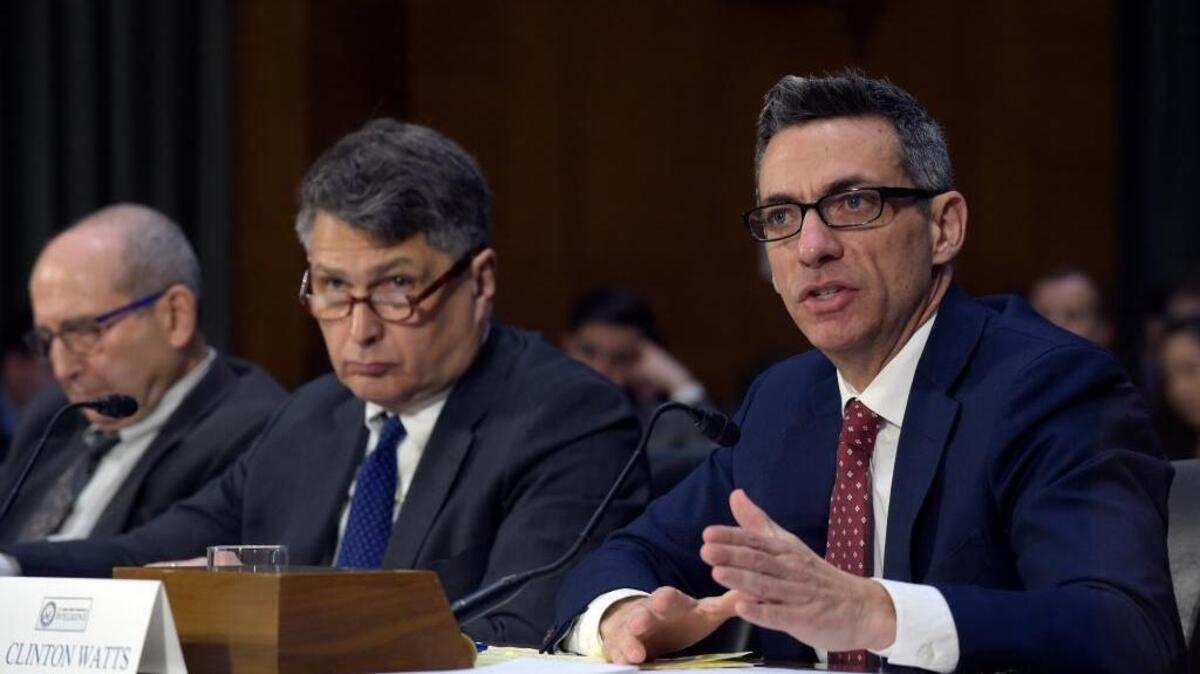 Clint Watts, right, a Senior Fellow at the Foreign Policy Research Institute Program on National Security, testifies before the Senate Intelligence Committee hearing on Capitol Hill in Washington on Thursday. He said Russia also meddled in the GOP primary campaign, also on Donald Trump’s side. He was joined at the witness table by Roy Godson, left, a professor emritus at Georgetown University, and Eugene Rumer, the director of the Russia and Eurasia program at the Carnegie Endowment for International Peace.