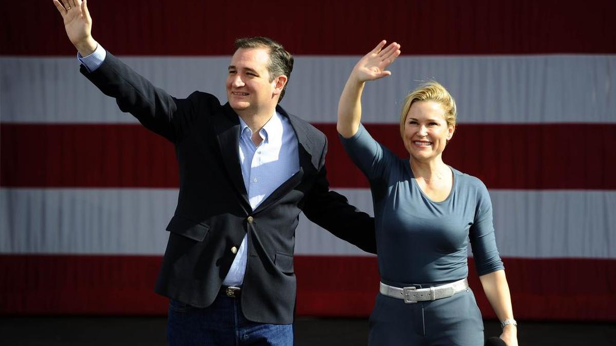 Republican presidential candidate Ted Cruz and wife Heidi wave to supporters during his Keep The Promise rally at the zMax Dragway in Concord, N.C., on March 13, 2016.