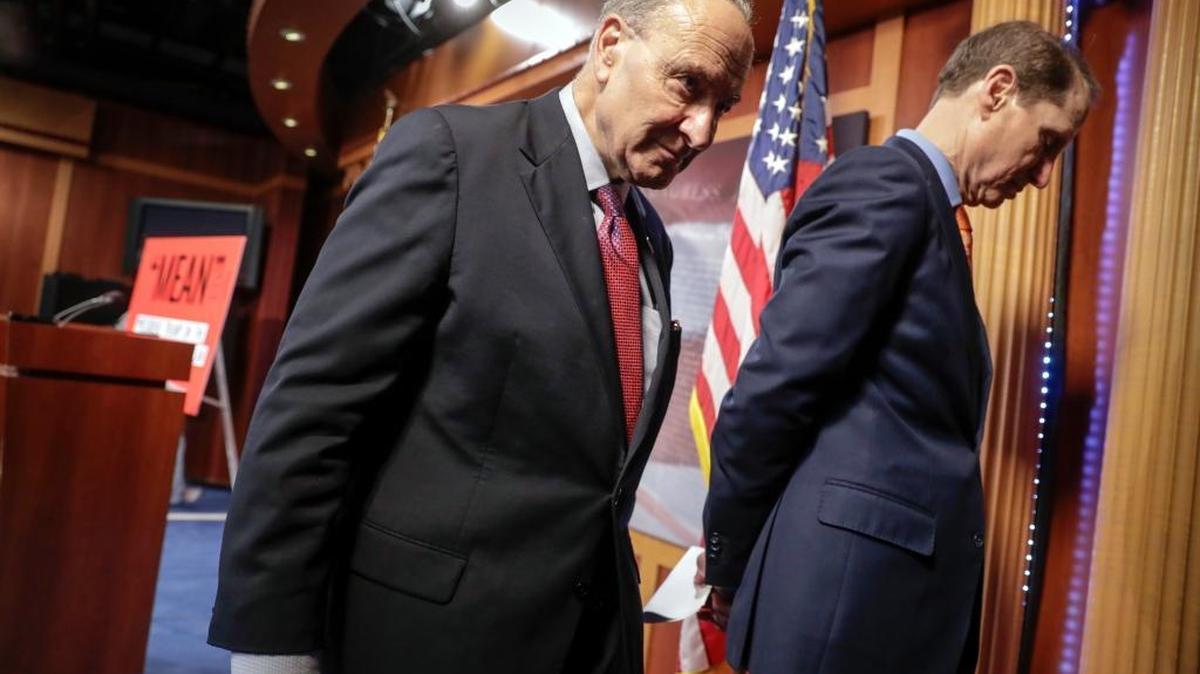 Senate Minority Leader Chuck Schumer, D-N.Y., and Sen. Ron Wyden, D-Ore., leave a news conference after responding to the release of the Republicans' healthcare bill at the Capitol in Washington, Thursday, June 22, 2017.