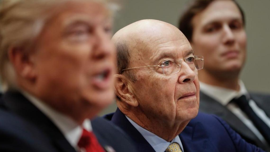 Commerce Secretary-designate Wilbur Ross, center, listens to President Donald Trump during a meeting with House and Senate legislators in the White House on Feb. 2, 2017. At right is White House Senior Adviser Jared Kushner.