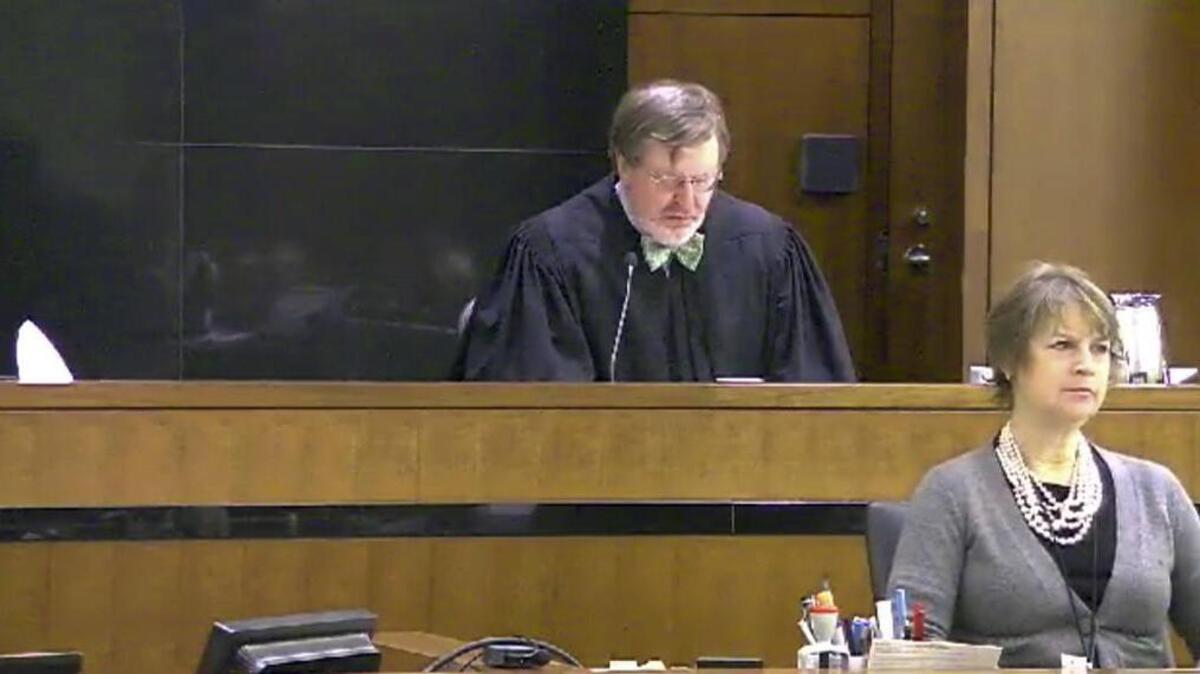 This still image taken from United States Courts shows Judge James Robart listening to a case at Seattle Courthouse on March 12, 2013 in Seattle. Robart placed a nationwide hold on President Donald Trump's executive order, banning travel to the United States by migrants from seven Muslim-majority countries, Friday, Feb. 3, 2017.